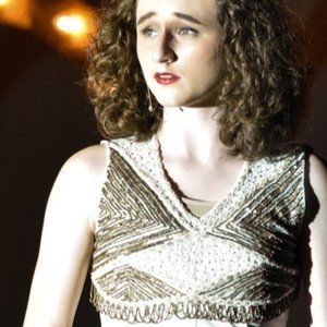 Two-piece white pant suit